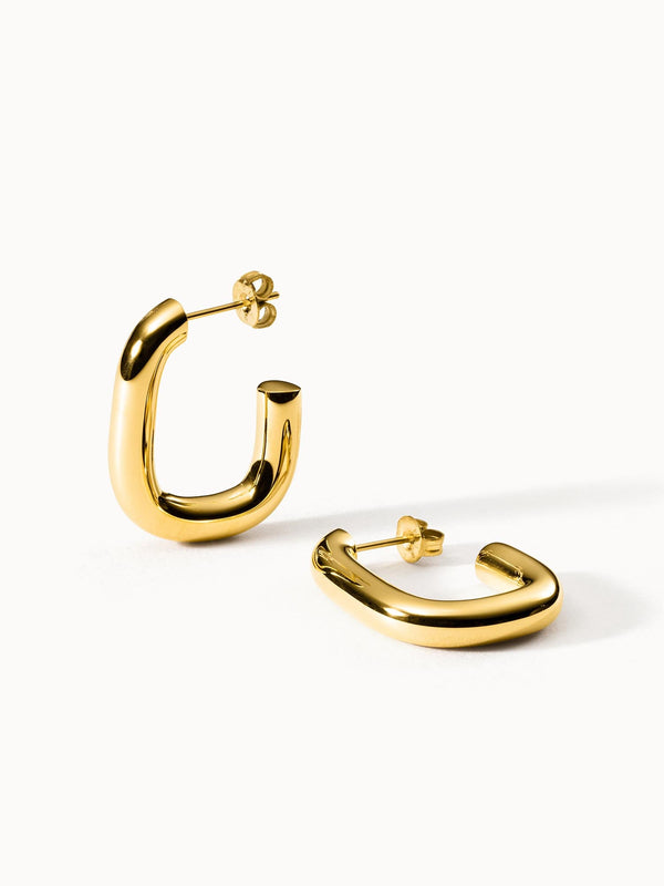 PURELEI Hula Ohrringe aus goldfarbenem Edelstahl, glänzend, cleanes Design, elegante feminine Ästhetik, nickelfrei.