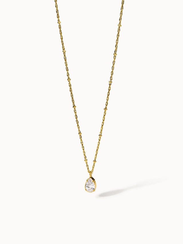 Felice Kette von PURELEI, goldene Edelstahlkette mit weißem Zirkonia-Tropfen, elegant und zeitlos feminin.