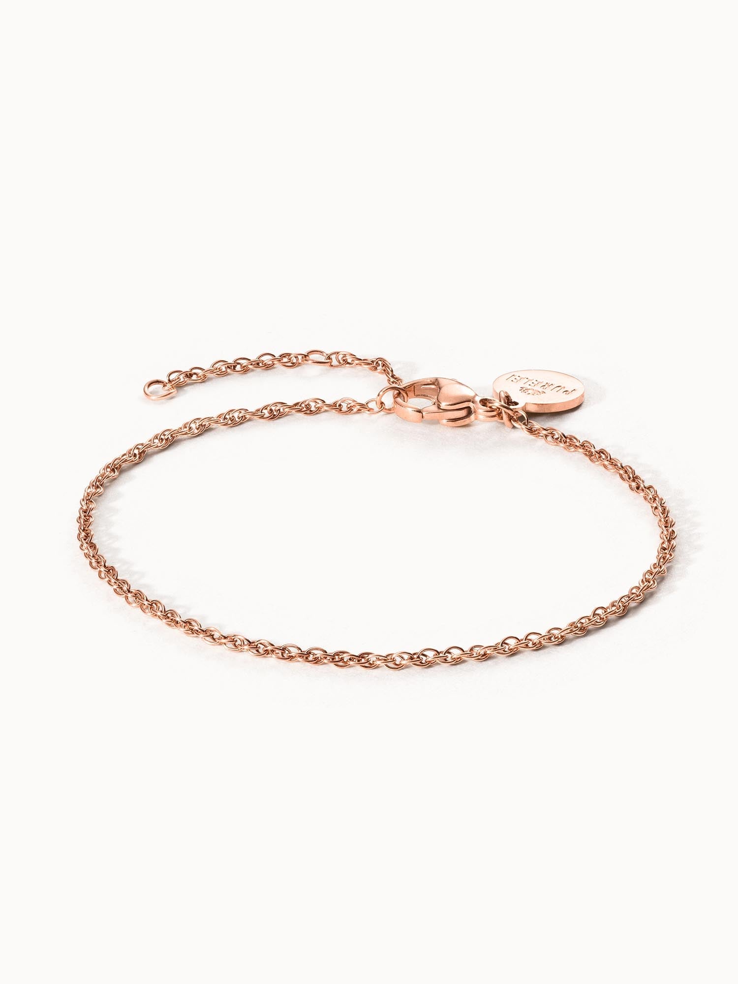Feines PURELEI Brave Armband in Roségold, zart und verstellbar, strahlt elegante Insel-Leichtigkeit aus.