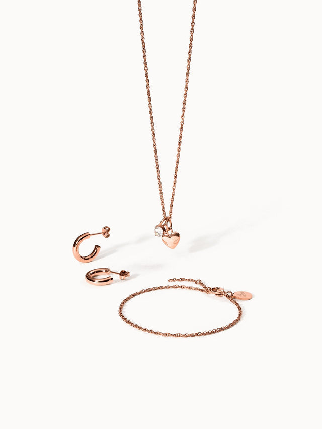 Roségoldenes Schmuckset mit Herzanhänger, Creolen und Armband von PURELEI.
