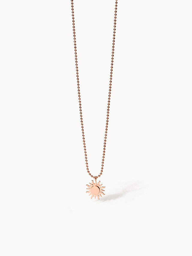 Roségoldene Kette mit Sonnenanhänger, PURELEI, elegant und strahlend.