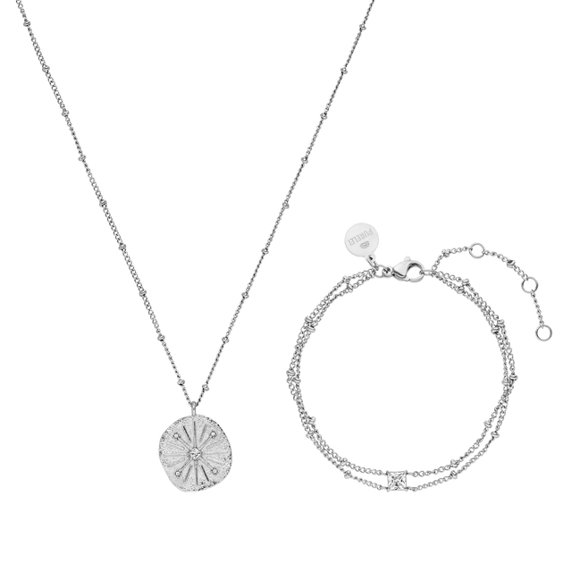 Silberne Kette mit Muschel-Anhänger und passendem Armband von PURELEI, elegant und modern.