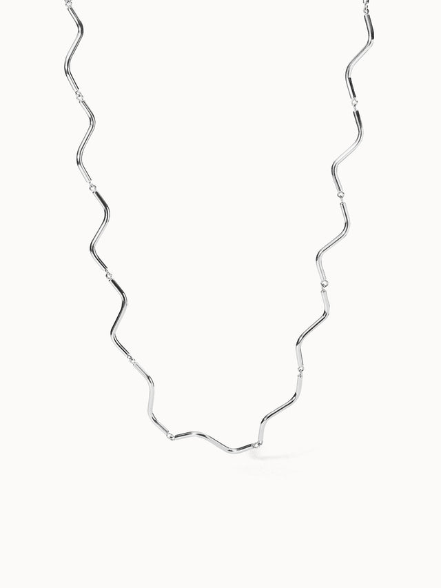 Silberne Wellenkette von PURELEI mit elegantem Design und tropischer Leichtigkeit.