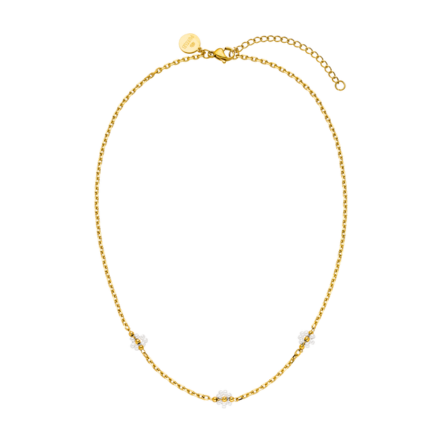 Goldene Kette mit weißen Perlen-Details von PURELEI, elegant und feminin.