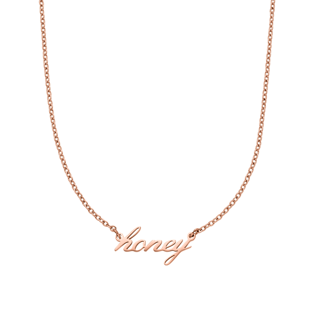 Honey Kette aus 18K rosévergoldetem Edelstahl mit geschwungenem Schriftzug, PURELEI, femininer Island-Spirit.