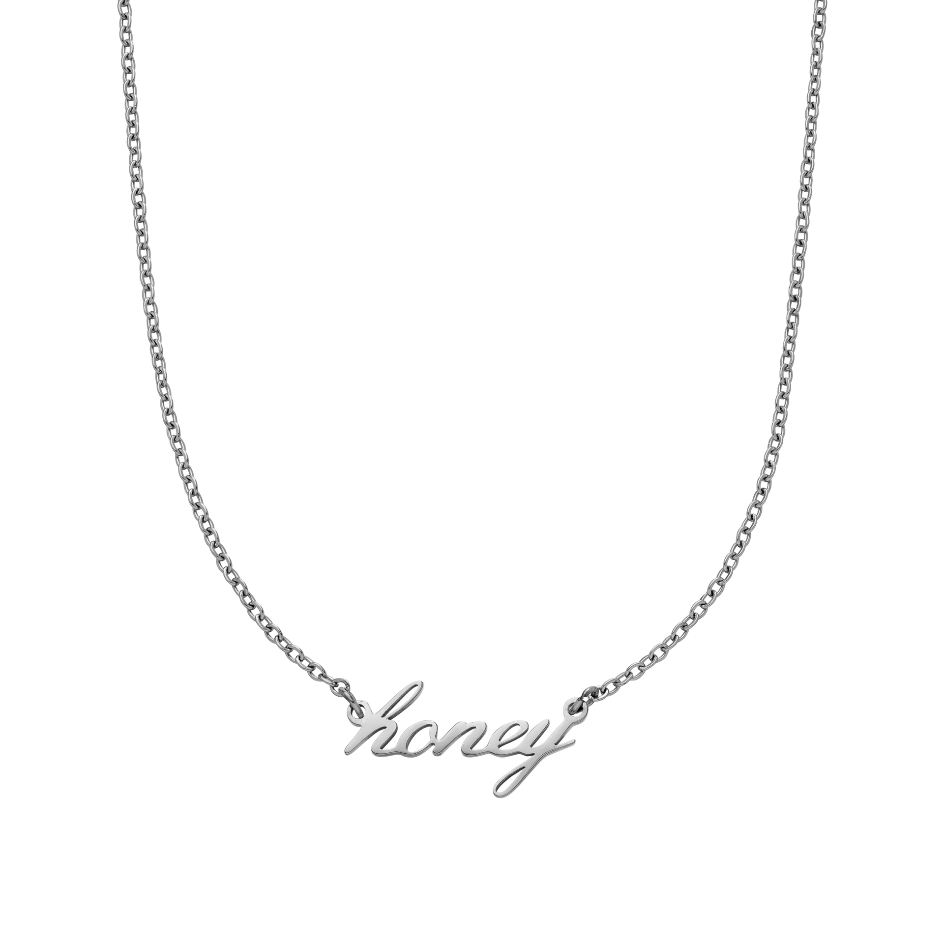 Silberne PURELEI Honey Kette aus Edelstahl mit geschwungenem Schriftzug, elegant und zeitlos gestaltet.
